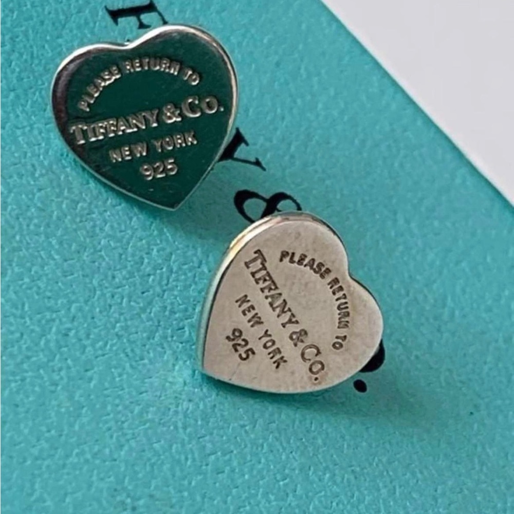 Tiffany & Co. Mini heart sterling silver stub earrings.
